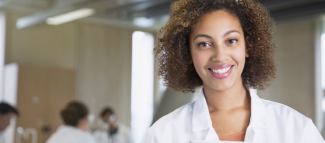 a black woman in lab coat